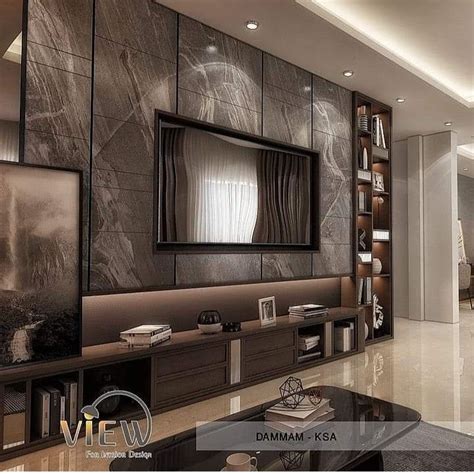 An Elegant Living Room With Marble Walls And Flooring Is Pictured In