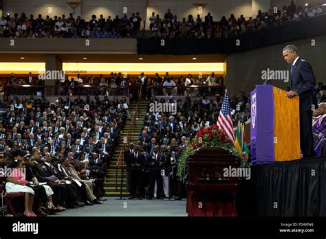 U S President Barack Obama Pauses While Giving The Eulogy At The