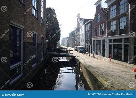 Small Canal Along the Peperstraat in the Old Town of Gouda in the Netherlands. Editorial Stock ...