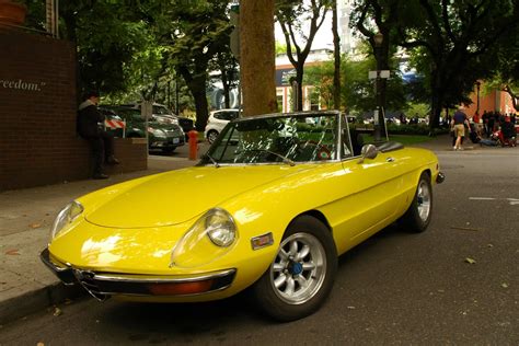 OLD PARKED CARS.: 1970 Alfa Romeo Spider.