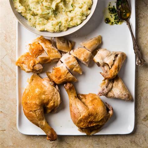 Butterflied Chicken With Garlic Smashed Potatoes America S Test Kitchen Recipe