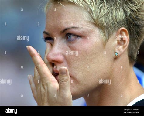 Dpa German Shot Putter Astrid Kumbernuss Wipes Away A Tear After