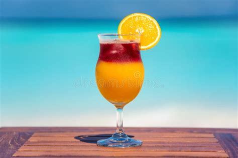Sex On The Beach Cocktail On Wooden Table At The Beach Stock Photo