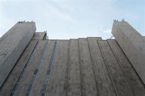 Premium Photo Solid Built Structure Against Bright Sky