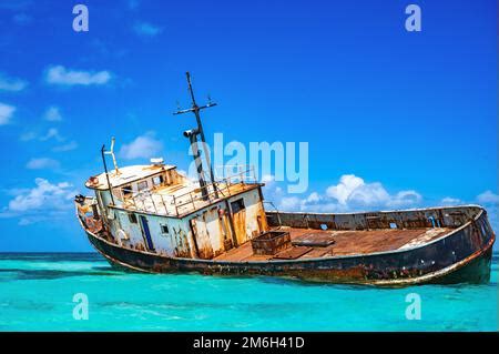 An Old Shipwreck Or Abandoned Vessel Aground Stock Photo Alamy