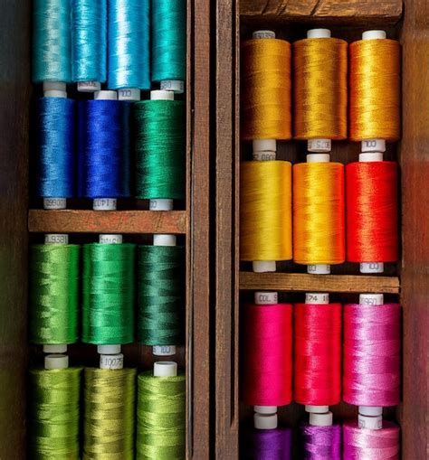 Premium Photo Close Up Picture Of Spool Of Colorful Threads In The