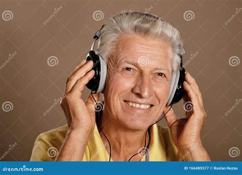 Portrait Of Senior Man Listening To Music Stock Image Image Of Listen