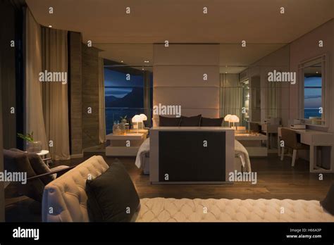 Illuminated Luxury Home Showcase Bedroom At Night Stock Photo Alamy