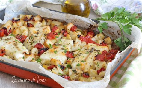 Nasello Al Forno Con Patate E Pomodorini