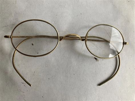 Antique Wire Rimmed Oval Eye Glasses Gold Tone Signed Gem