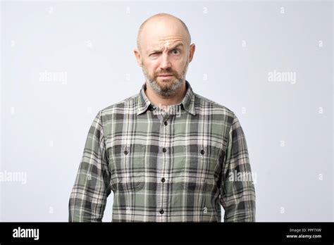 Closeup Portrait Of Angry Mature Man About To Have Nervous Breakdown Isolated On Gray Wall