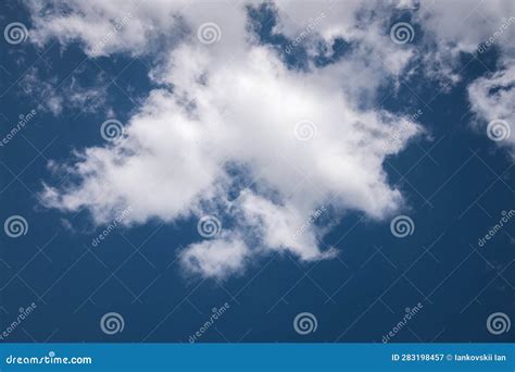 Close Up Of A White Cloud Against A Dark Blue Sky Cloud Background