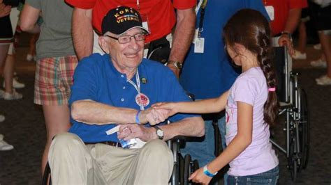 Vets Return From Honor Flight To Emotional Homecoming