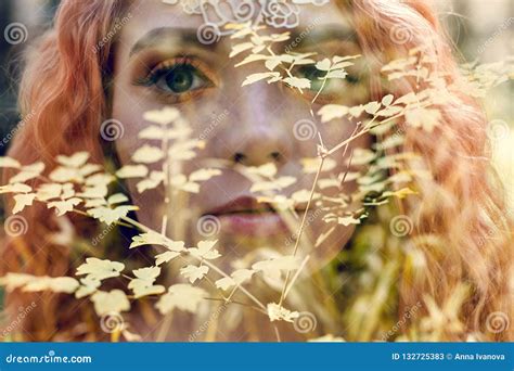 Beautiful Redhead Norwegian Girl With Big Eyes And Freckles On Face In The Forest Portrait Of