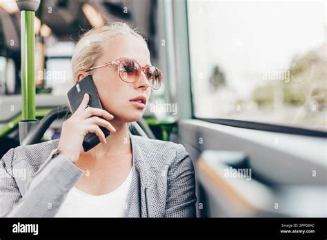 Blonde Business Woman Traveling By Bus Stock Photo Alamy