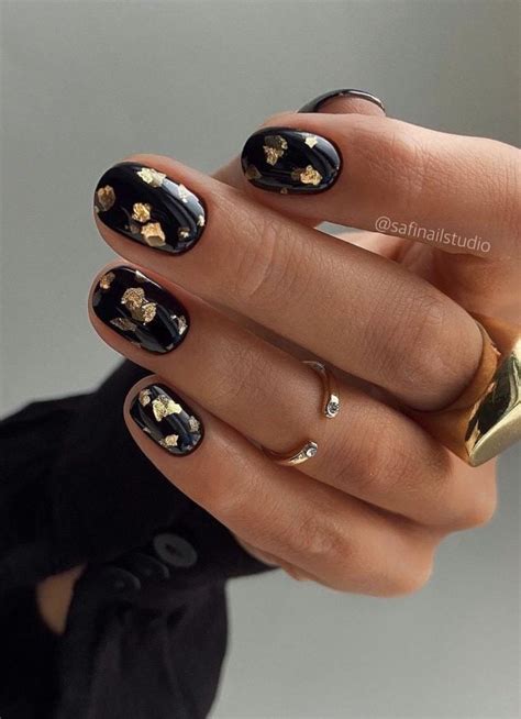 21 Glam Black And Gold Nails For Your Next Mani