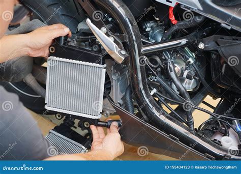 Expert Technician Install A Radiator To Motorcycle Or Scooter The