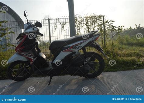 Silhouette Of Honda Beat And Light Iron Fence In The Morning Editorial