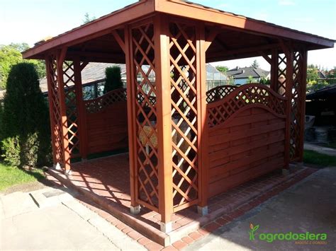 A Wooden Gazebo Sitting On Top Of A Sidewalk