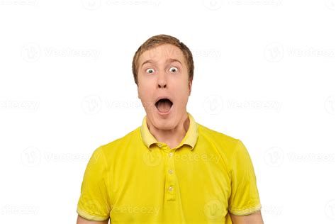 Surprised Young Male With Funny Face With Wide Open Mouth In Yellow T