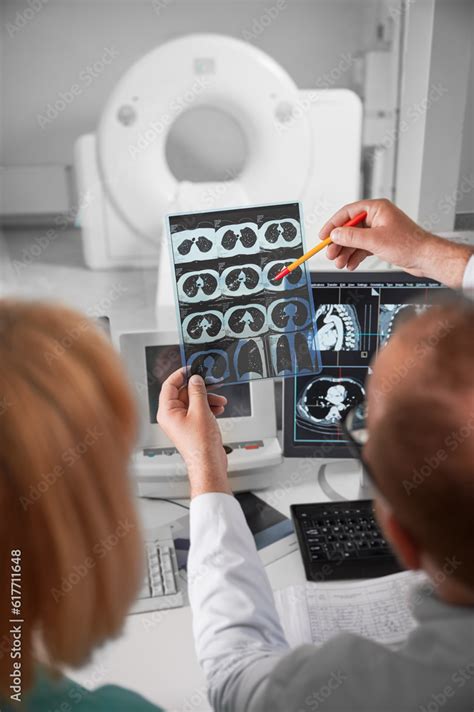 Medical Computed Tomography Or MRI Scanner Back View Of Doctor And