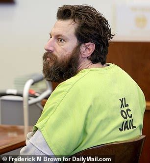 Maniac accused of decapitating his own parents shocks court as he