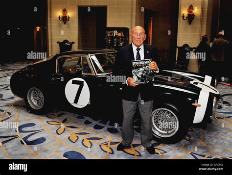 Sir Stirling Moss Stands In Front Of The Ferrari 250 GT SWB Which He