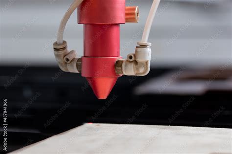 Laser CNC cutting wood. Modern machine industrial technology Stock ...