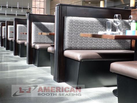 Modern booth style . Plain back , cushion seat , laminated kick base