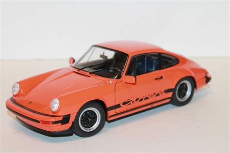 PORSCHE 911 930 3 0 CARRERA ORANGE SOLIDO 1 18