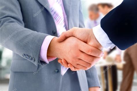 Рукостискання ізольовані на фоні бізнес — Стокове фото © depositedhar ...