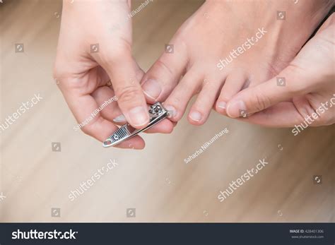 Closeup Of A Woman Cutting Nails Stock Photo 428401306 Shutterstock