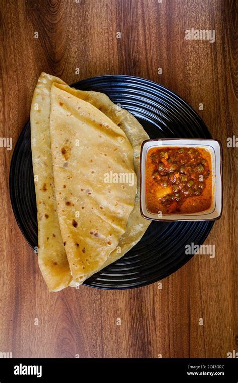 Chapati With Chicken Curry Mix With Sardine Sambal Stock Photo Alamy