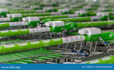 Close Up of ASDA Shopping Trolley - Green Handles B Editorial ...