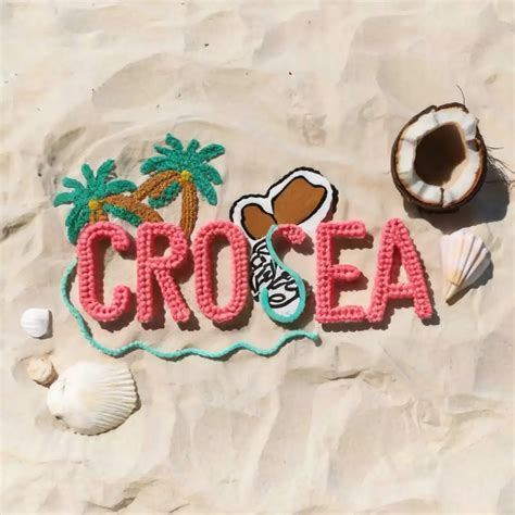 LOGO Design For Cro Sea Vibrant Pink And Blue Crochet Bikini With Coconut Tree Shells Theme AI