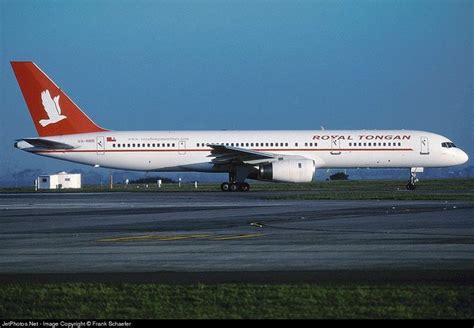 A Large Passenger Jet Sitting On Top Of An Airport Runway