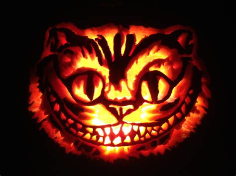 Here is a pumpkin carving of the Cheshire Cat that I did today. : pics