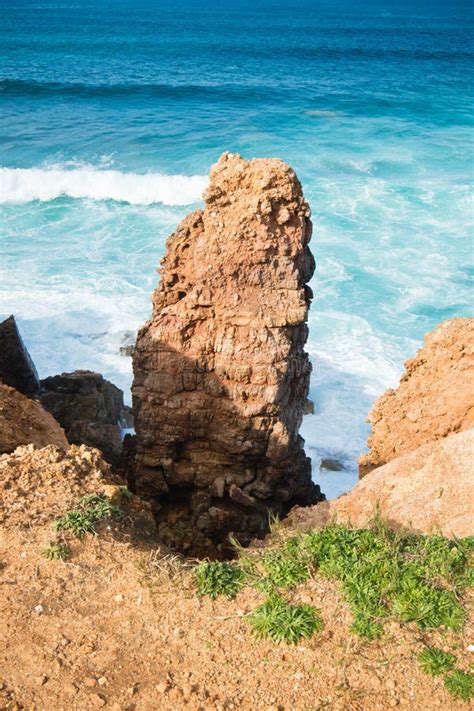 Erosion Red Soil Cliffs Rocks On Atlantic Coast In Beautiful Turquoise