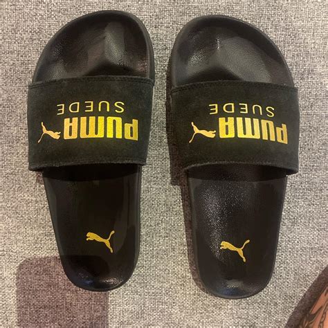 Puma Slides Gold And Black Excellent Condition Depop