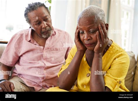 Senior Man Comforting Woman With Depression At Home Stock Photo Alamy