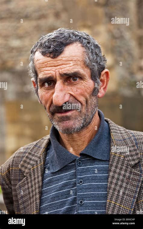 Georgian man with face full of character outside Sveti Tskhoveli Stock ...
