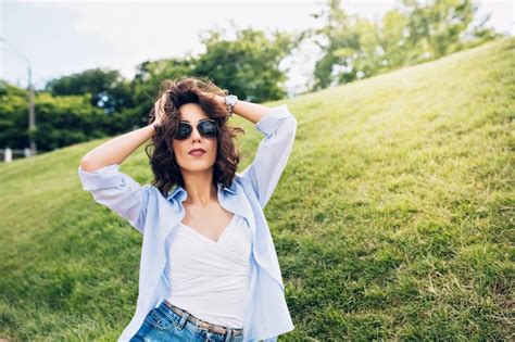 Free Photo Portrait Of Cute Brunette Girl With Short Hair In Sunglasses Posing To Camera In