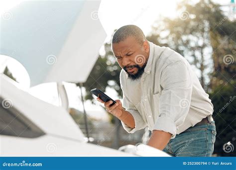 I Shouldve Became A Mechanic A Mature Male Stuck With His Car Outside Stock Photo Image Of