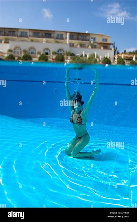 Woman In Bikini Underwater In Swimming Pool Hotel Above Water Stock Photo Alamy