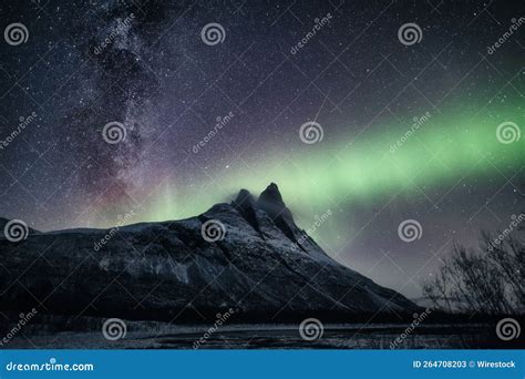 Breathtaking View Of The Northern Lights Or Aurora Borealis In Troms