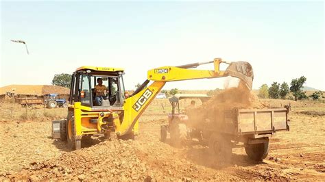 Jcb Dx Eco Expert Loading Mud In Massey Ferguson Dl Euro Plus