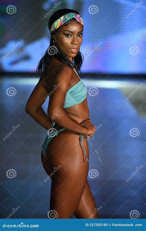 A Model Walks The Runway For Almost Naked Swim Show Editorial Image Image Of Miami Attractive