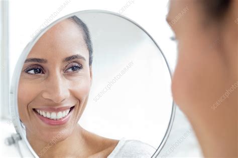 Woman Looking In Mirror Smiling Stock Image F0194367 Science