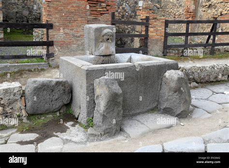 Public Drinking Water Fountain On Via Stabiana Pompeii Italy Stock