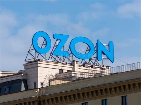 Large Blue OZON Sign on the Roof of the Building, Against a Blue Sky ...